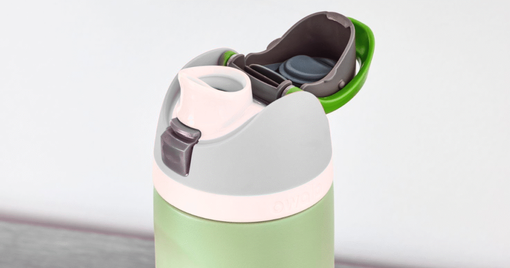 Green and white Owala water bottle with a lid, emphasizing the importance of regular cleaning for hygiene.